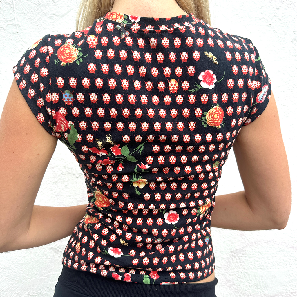 Lady beetle baby tee